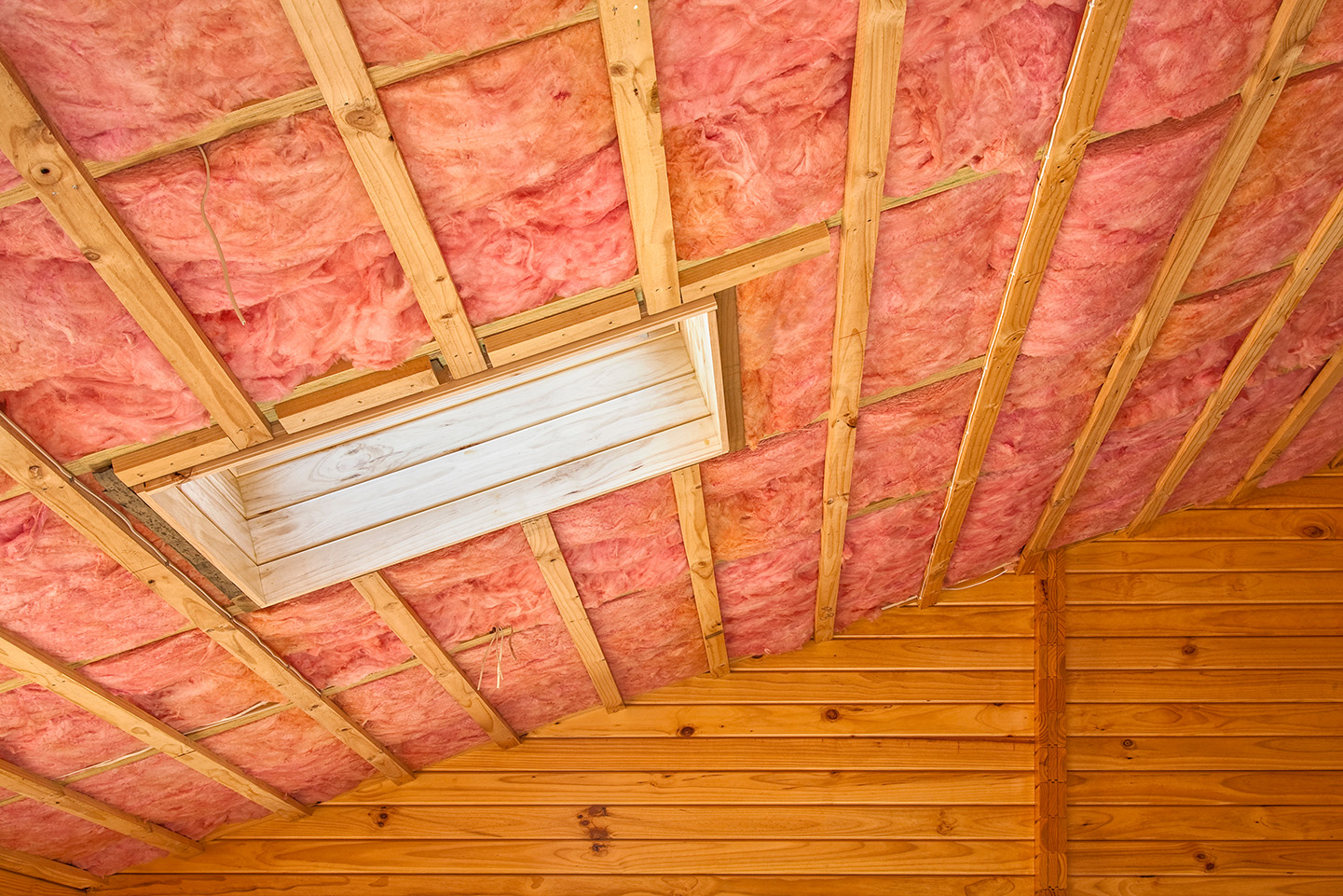 fiberglass insulation batts in an attic