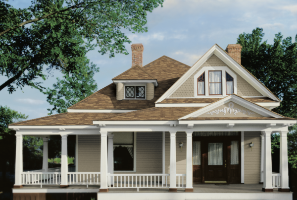A home featuring a roof with Owens Corning shingle color in brown