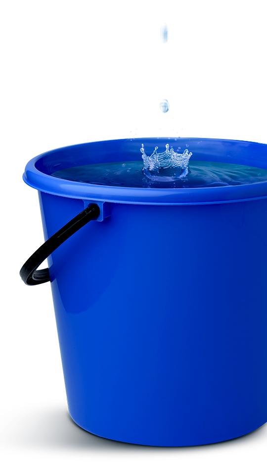 Water falling into a nearly full bucket of water